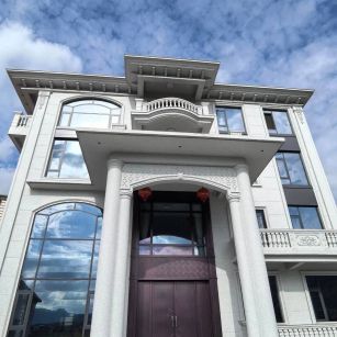 南充白麻别墅外墙干挂石材效果示例