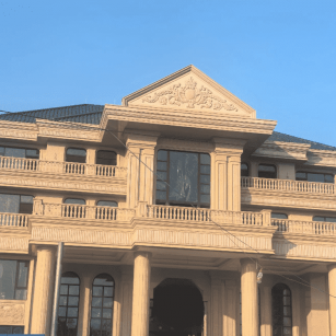 南充黄金麻别墅外墙干挂石材效果示例