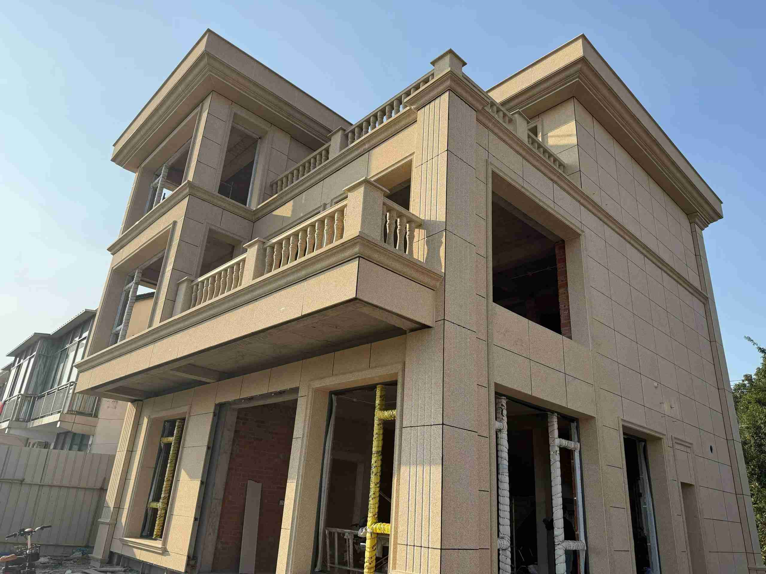 南充 黄金麻花岗岩石材荔枝面外墙干挂效果展示