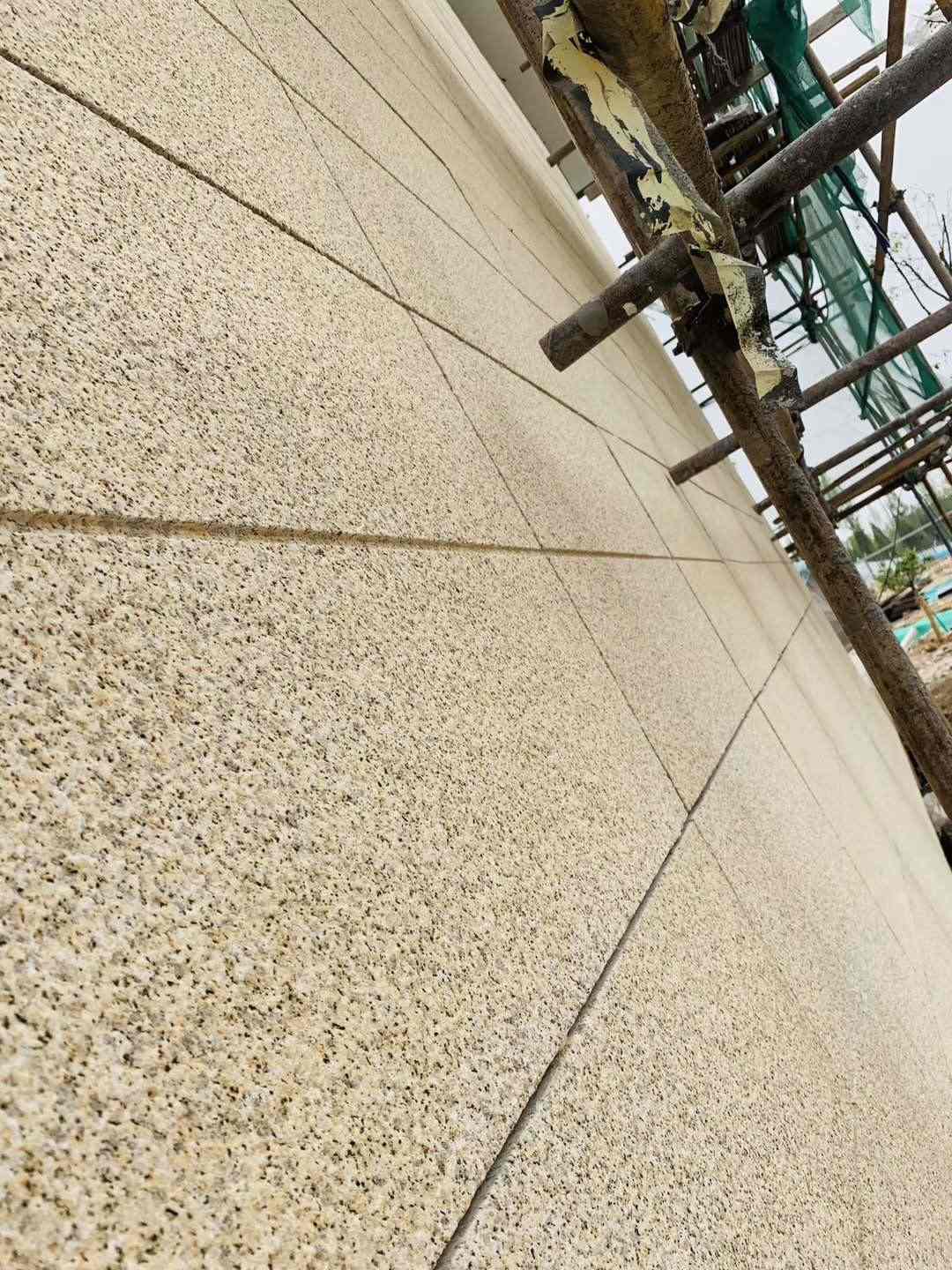 南充 黄金麻花岗岩荔枝面外墙干挂石材效果示例